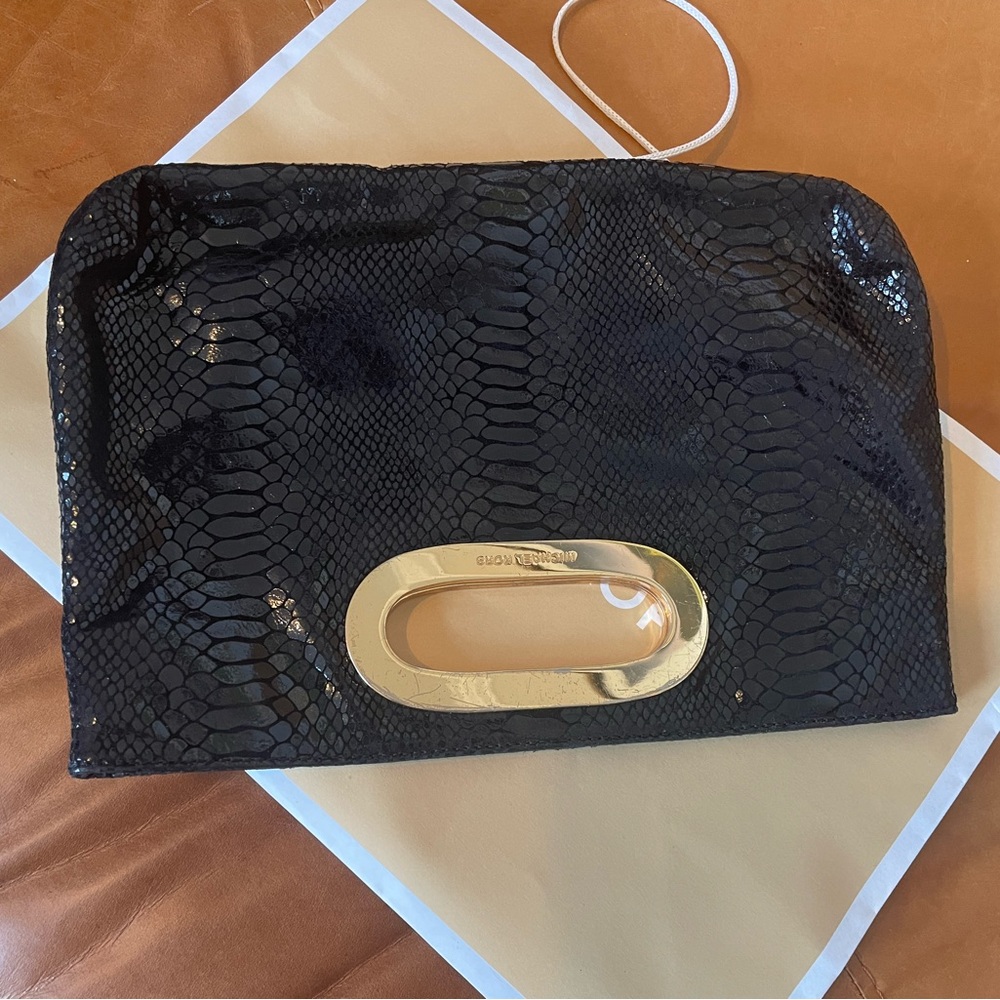 Michael Kors Snake Skin leather Clutch black used excellent condition